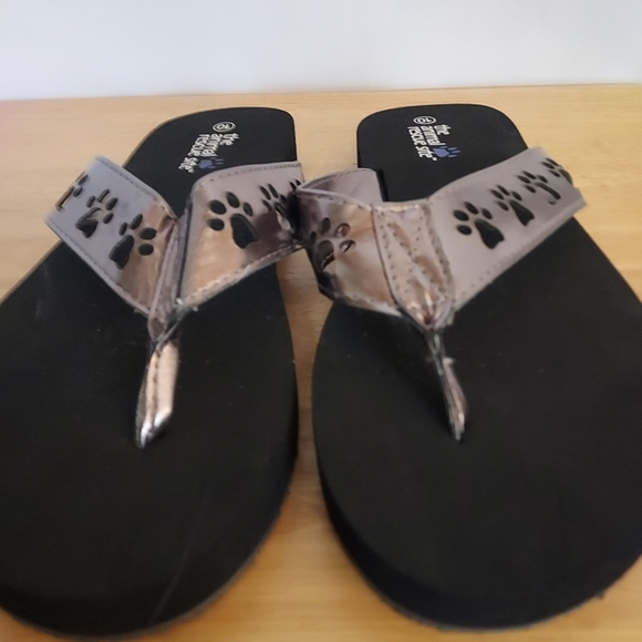 Black and Silver Flip Flops with Paw Print Design - Picture 1 of 5